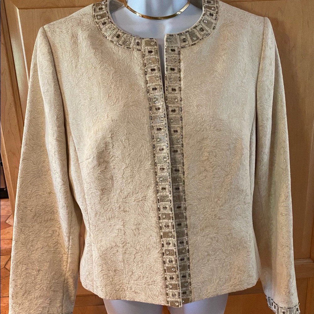 Two piece gold simmering women’s suit.